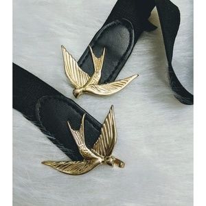 Black elastic belt with gold bird clasp